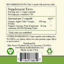 photo of the back of the label for herbal roots apple cider vinegar capsules showing the nutritional facts. Directions, take 1 capsule with meal daily. Supplement facts: serving size is 1 vegan capsule, 60 servings per container. Amount per 1 capsule, 650 mg Organic apple cider vinegar powder, 20 mg organic cayenne fruit (35,000 heating units). Other ingredients: Vegan capsules and nothing else. No GMOs, soy, gluten, wheat, treenuts, peanuts, sugar, filler or preservatives. Distributed by Elite Source Products, Inc. La Crescenta CA 91214. www.herbalrootssupplements.com Made in the USA