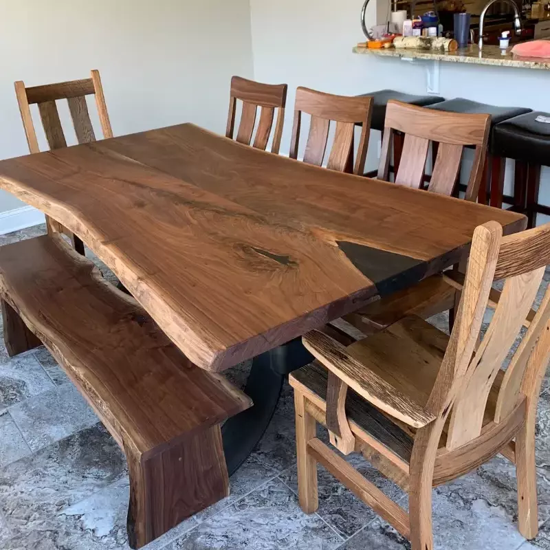 live edge walnut dining table with black epoxy