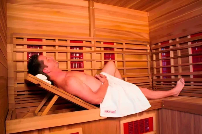 A man Relaxing inside Infrared Sauna