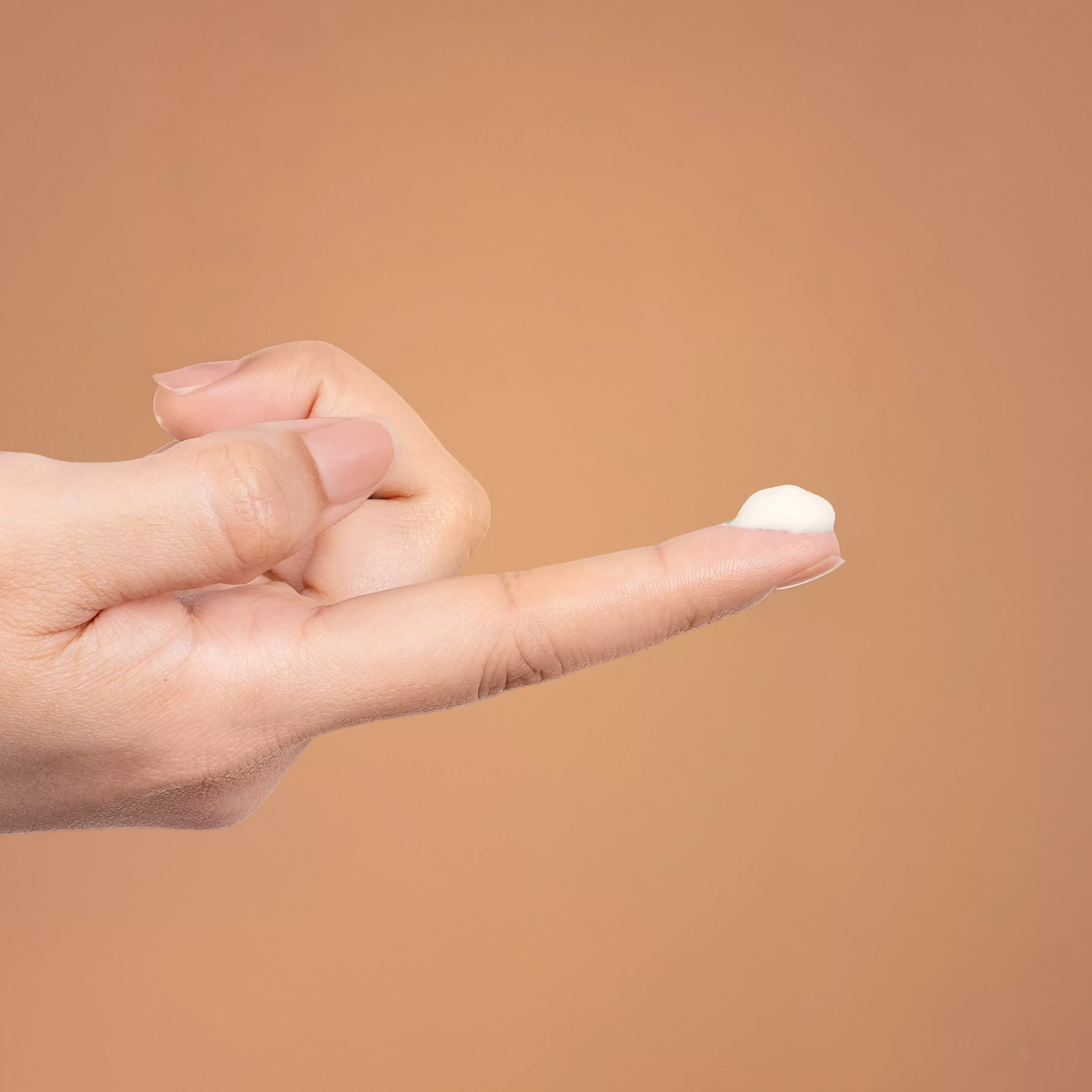 Scoop a pea-sized amount of Blavana.