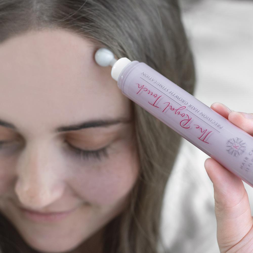 Woman applying Royal Touch