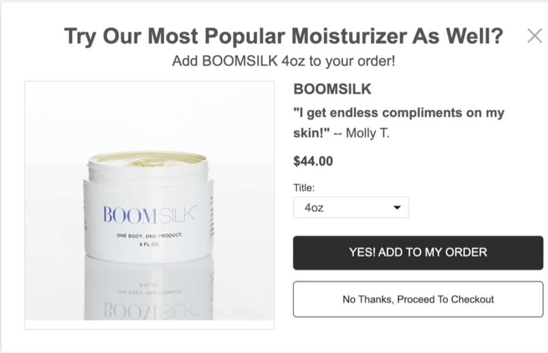 OneClickUpsell's pre-purchase upsell offer popup with headline "Try Our Most Popular Moisturizer As Well?"