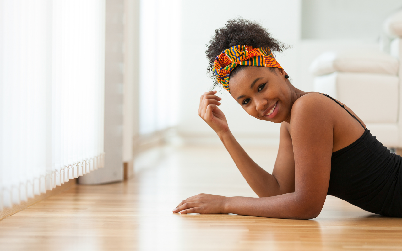 black woman with natural hair dry hair