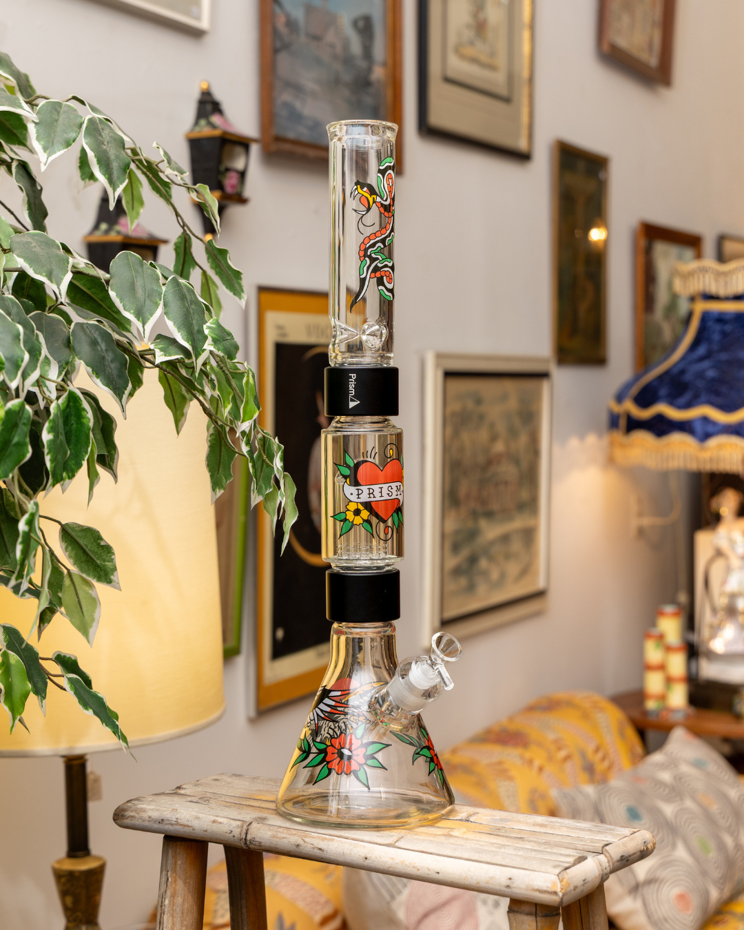 Prism Modular Beaker Double Stack Bong customized with Zac Cleminson 'Prism Inked' American Traditional tattoo decals. Features eagle and nautical flower base, tree percolator with heart and banner decal, and snake decal mouthpiece. Ultimate custom water pipe design.