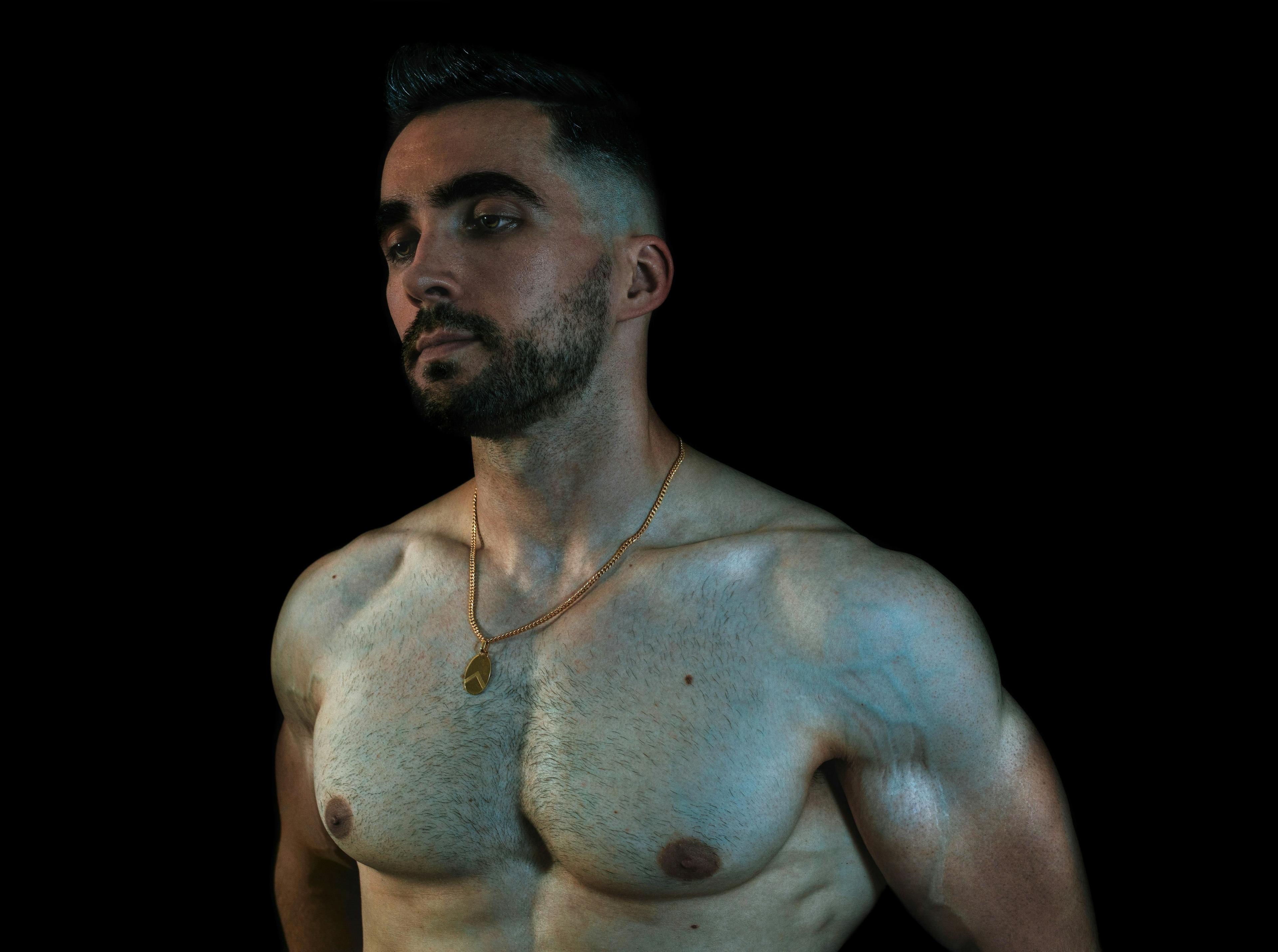 man shirtless showing chest muscles
