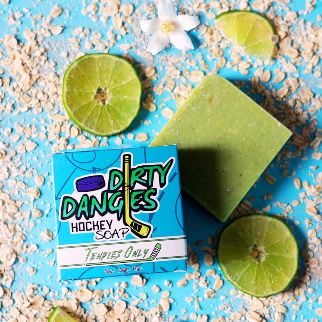 tendies only green jasmine lime hockey goalie soap on a blue background with limes, jasmine flowers and oatmeal