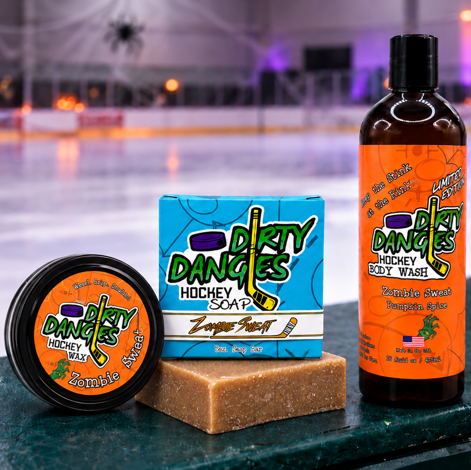 dirty dangles zombie sweat pumpkin spice scented bundle stick wax soap bar and body wash on hockey boards with halloween decor in the background