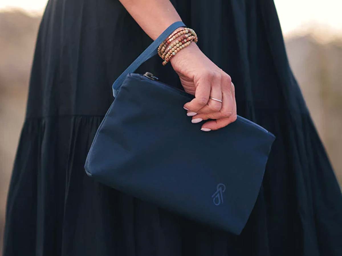 PowderLoft Tote Bag—shell wristlet, plenty of pockets to organize, yoga mat straps, and a keychain clip.