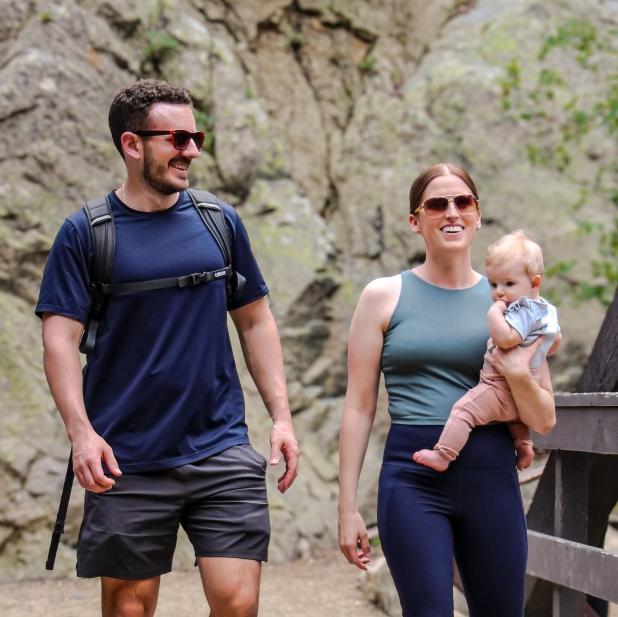 Family enjoying a mountain hike together.
