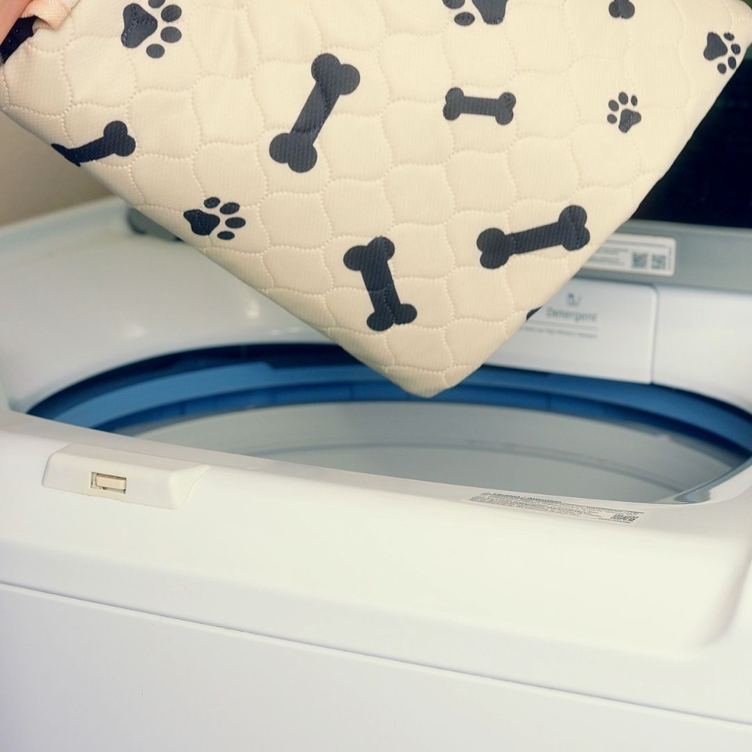 Placing reusable pad into washing machine