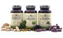 Herbal Roots Organic Garlic, Oil of Oregano and Black Elderberry side by side with capsules from each one in front of their bottles