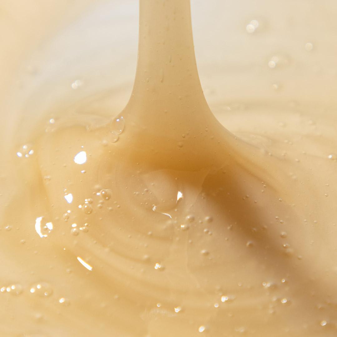 1. image shows a cleanser dropping