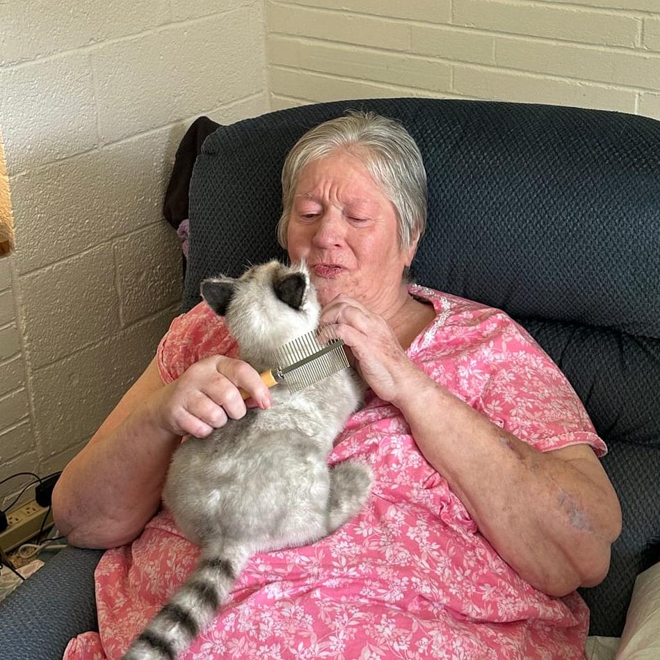 Pet parent with custom plush replica