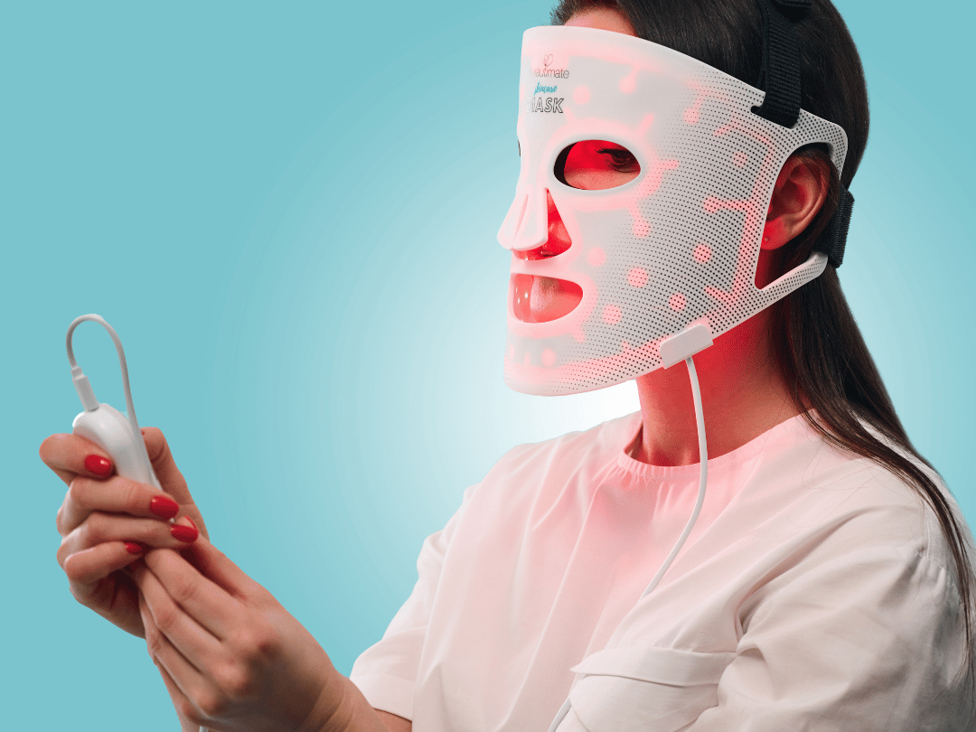 woman using our led mask