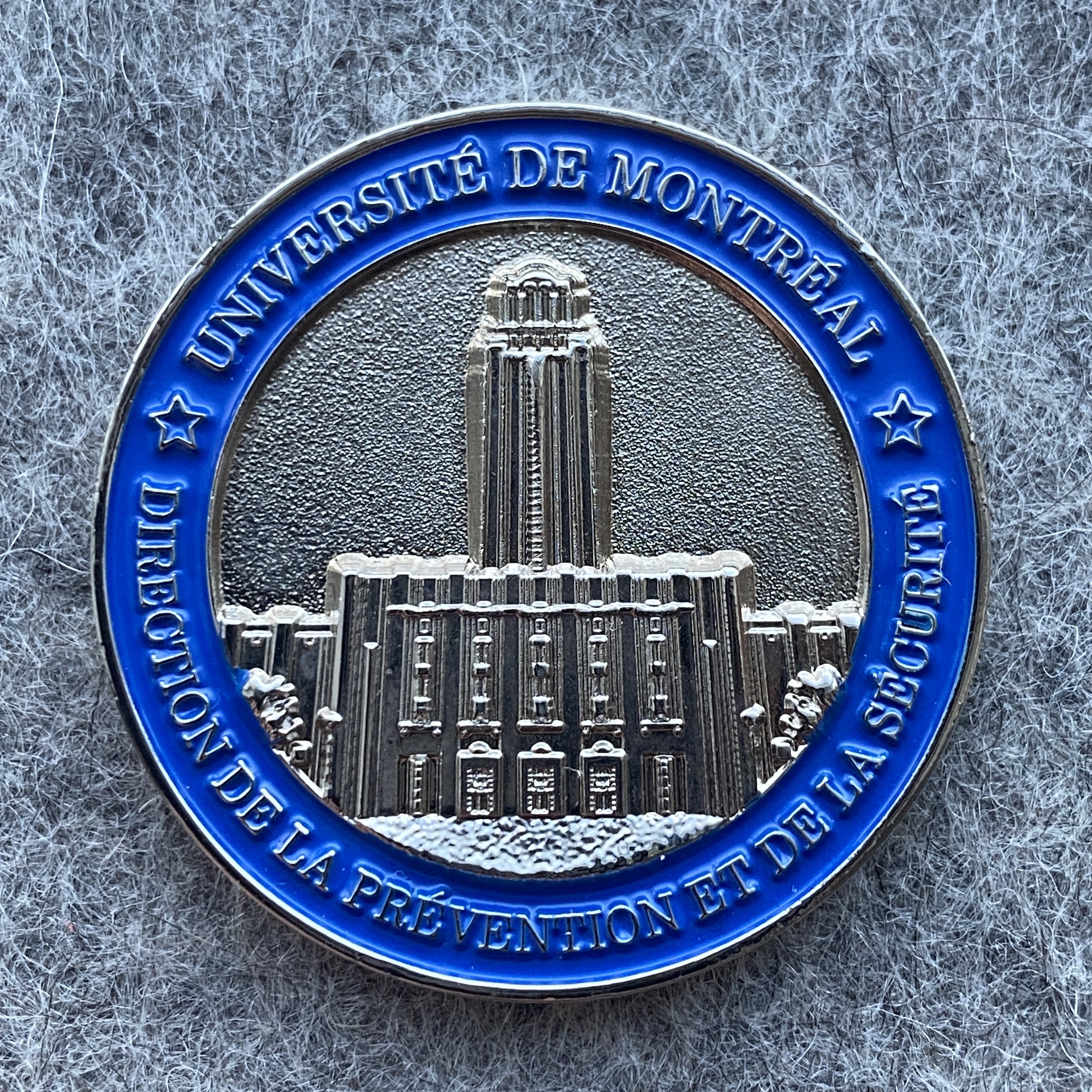 a custom made coin for the university of montreal