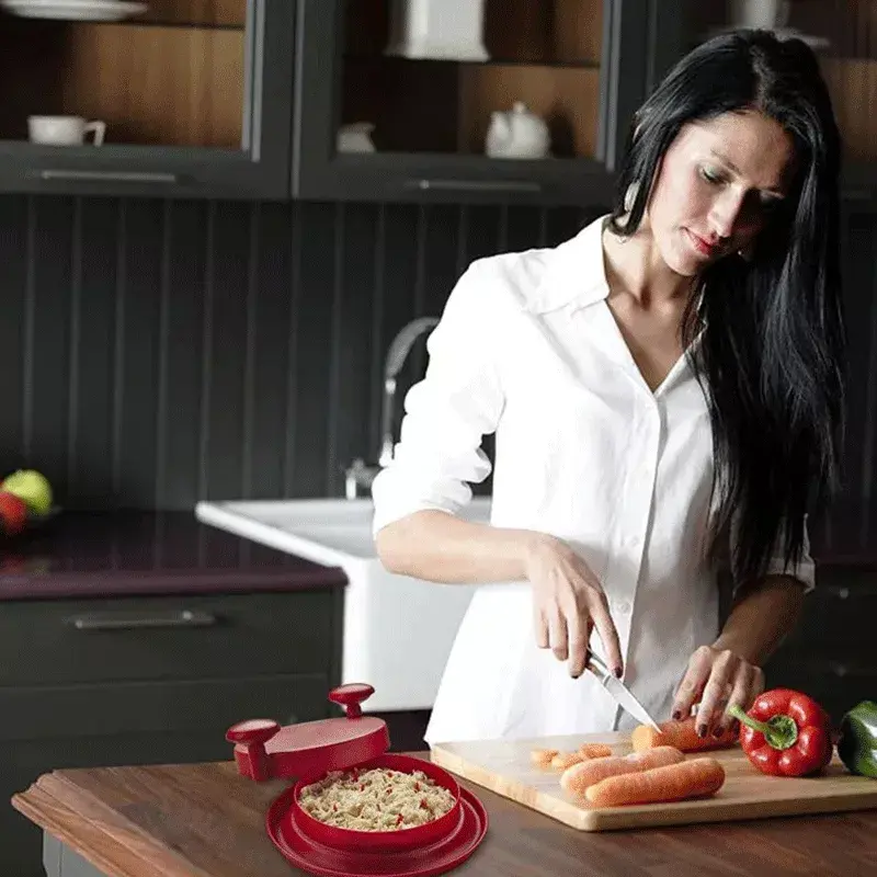 Woman chopping carrots in her kitchen