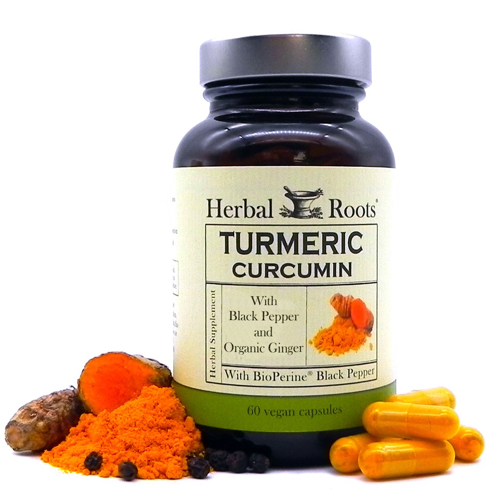Herbal Roots Turmeric curcumin with capsules on the right of the bottle and fresh cut turmeric root, powder and black pepper kernels.
