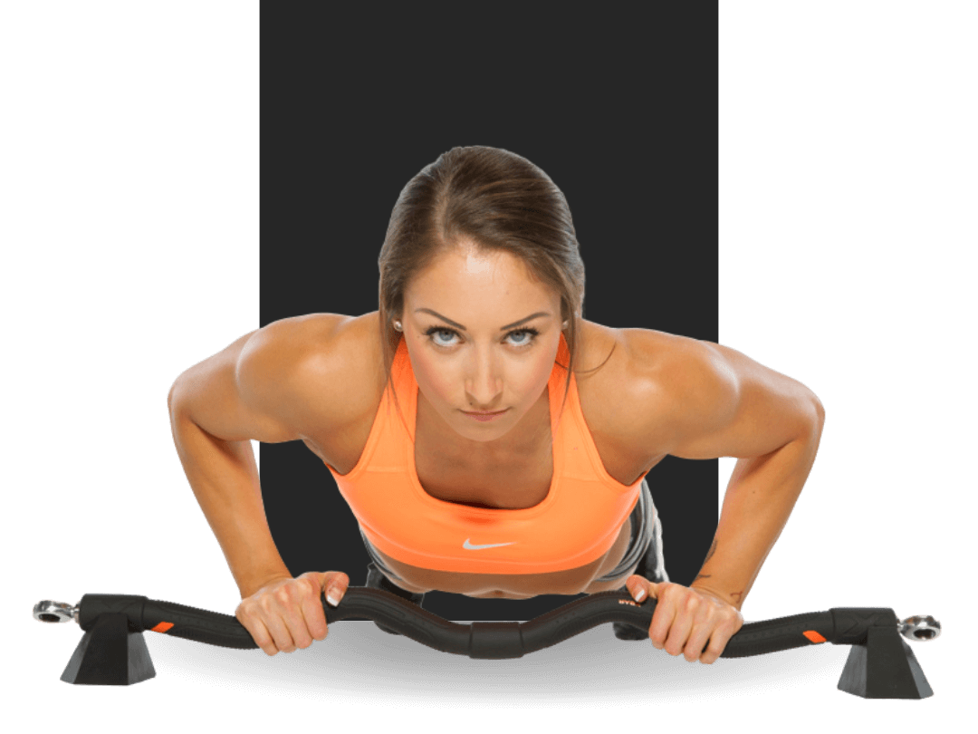 woman using xbar resistance bar system for pushups