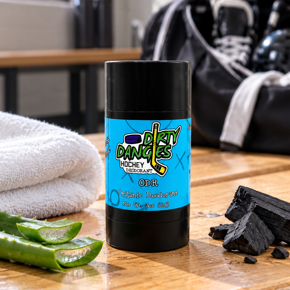 aluminum-free deodorant ODR fresh mountain air scent on a wooden bench in a hockey locker room with aloe and charcoal