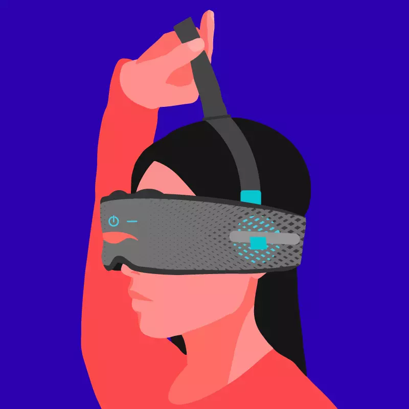 A girl pulling on the over-head strap of a gray sleep mask with headphones.