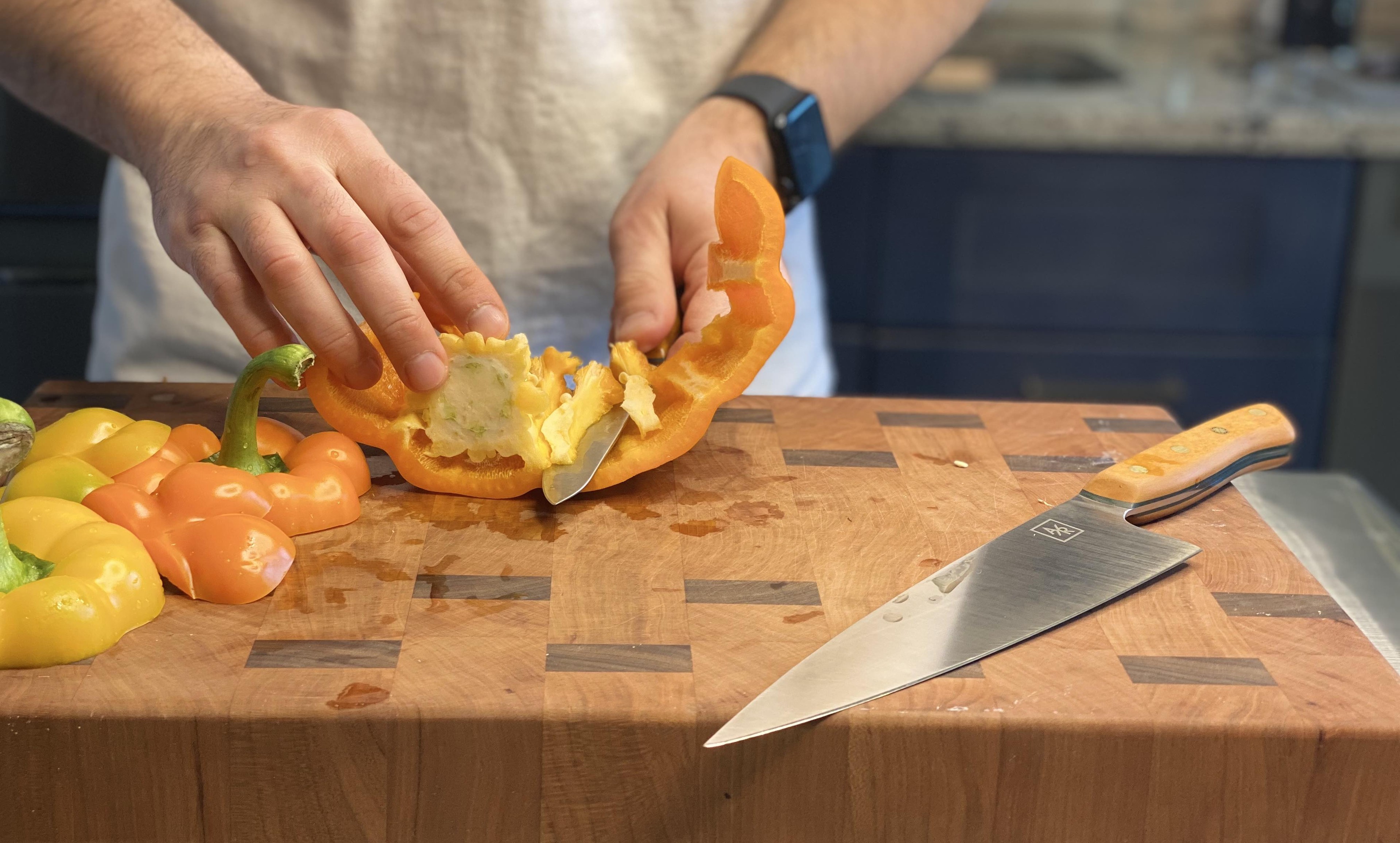 Removing the pith from an orange pepper with an Artisan Revere small petty knife