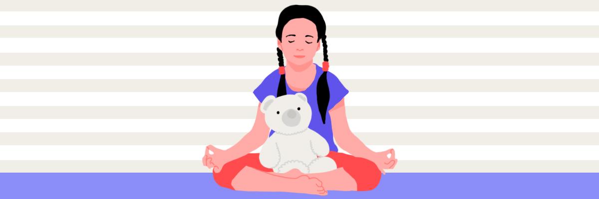 A toddler sitting on the floor with a teddy bear on her stomach is practicing the breathing buddy meditation technique for kids.