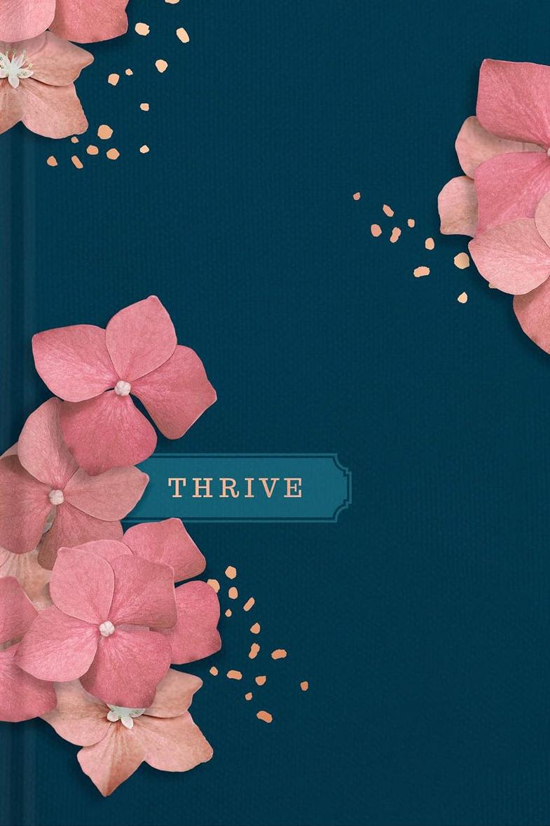 NLT Thrive Devotional Bible for Women with a teal cover, pink blossoms and a matching spine.
