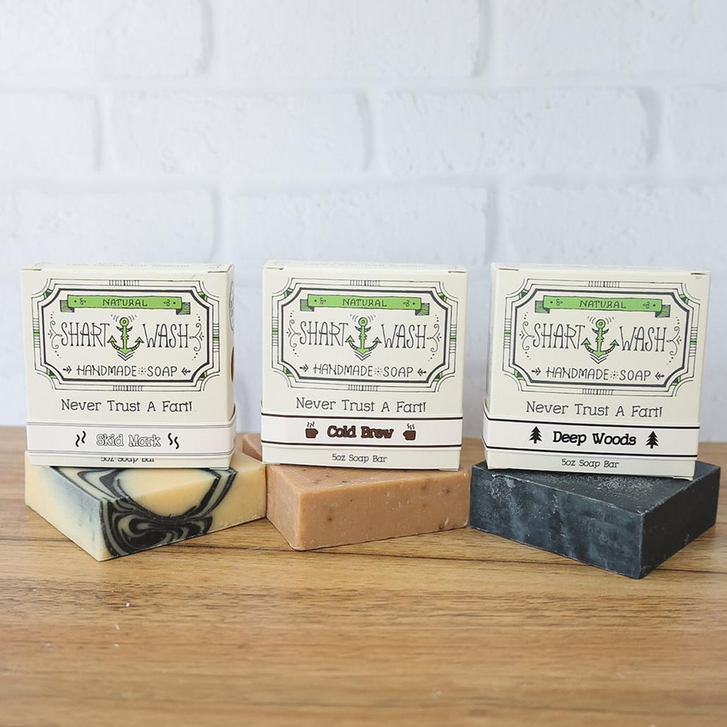 picture of 3 bars of shart wash soap bars on a wood table