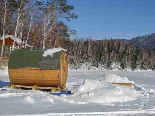 barrel sauna in the snow
