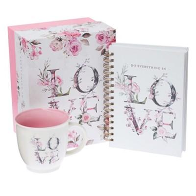 The word LOVE spelled in flowery script on mug, spiral journal, and gift box