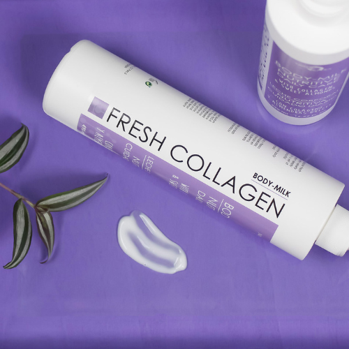 Noche's Fresh Collagen Body Milk laying at an angle against a purple background.