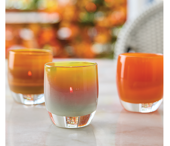 glassybaby votive holders transparent glass votives and pedestals on glass table