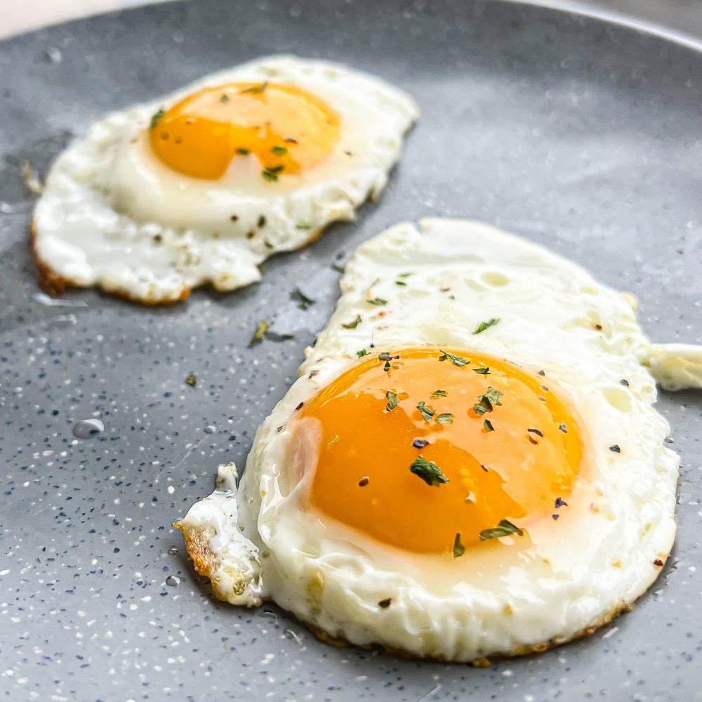 Two Organic sunny side up eggs