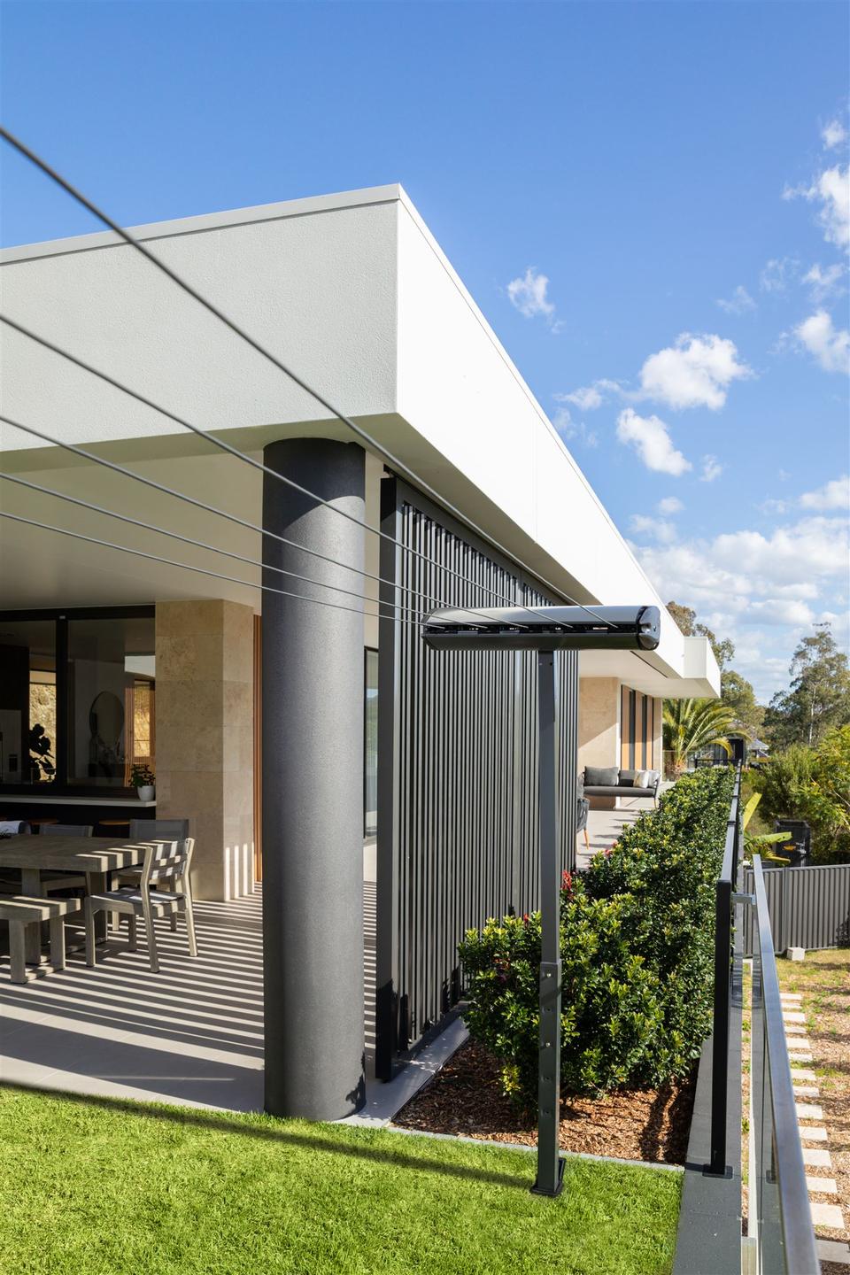 hills retractable clothesline installed on a post