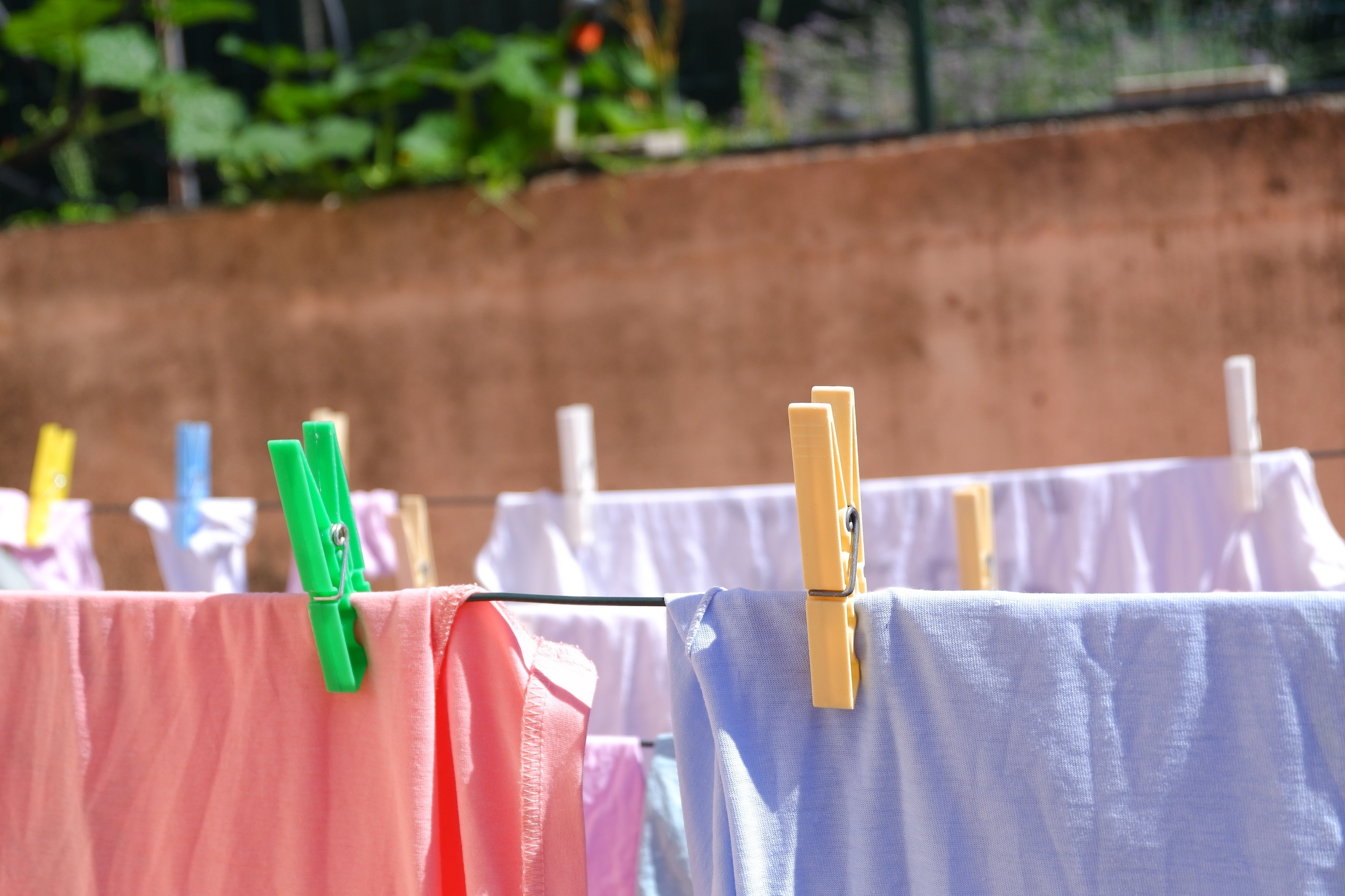 Why Dry Clothes Indoors: Privacy and Security