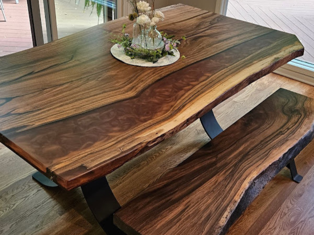 live edge walnut dining table with copper epoxy side river
