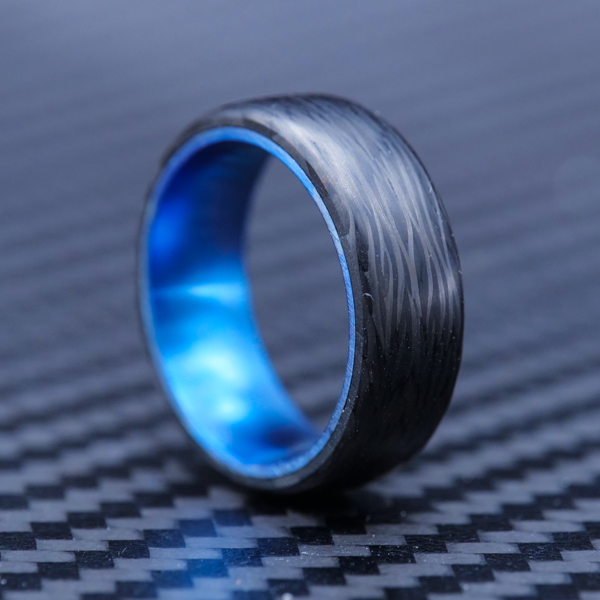 Carbon Fiber and Titanium are both cheap but durable materials making for a great affordable wedding band