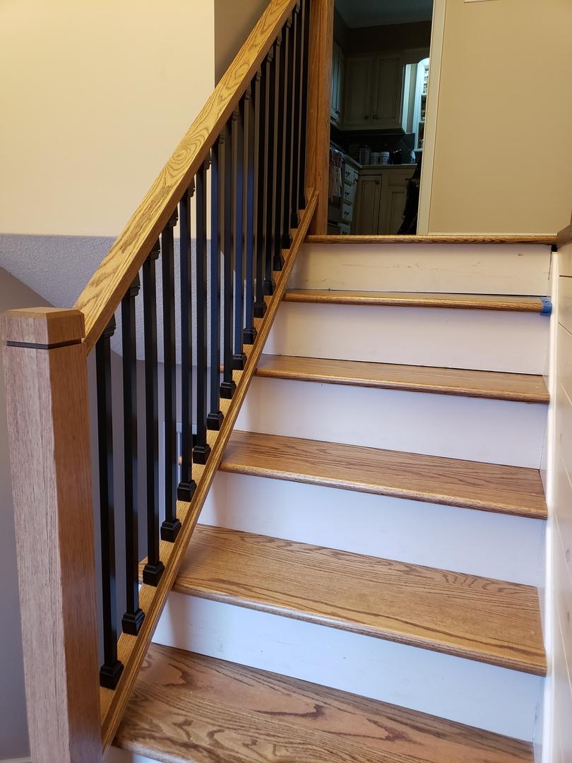 closed stringer snap'n lock balusters on a wood finish indoor stair case