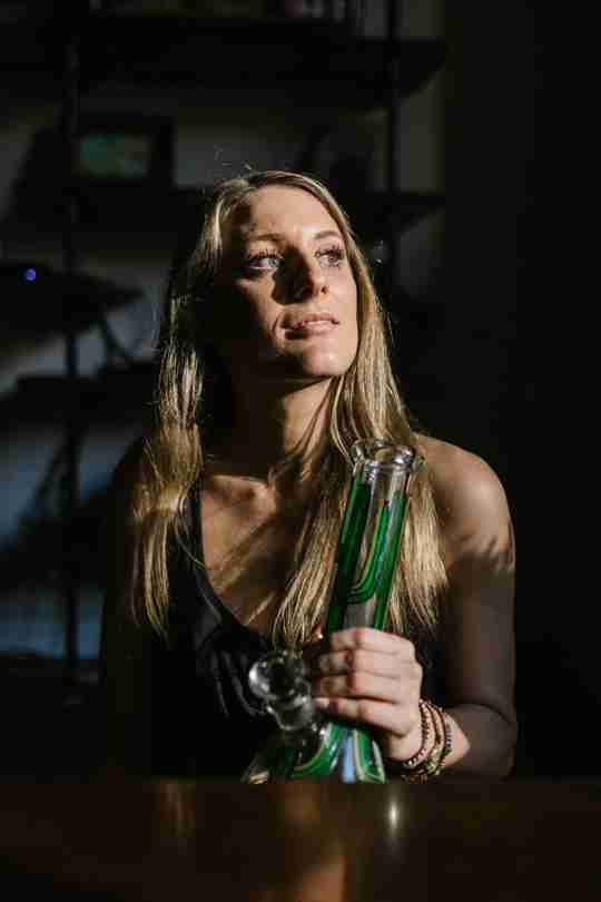 woman holding bong