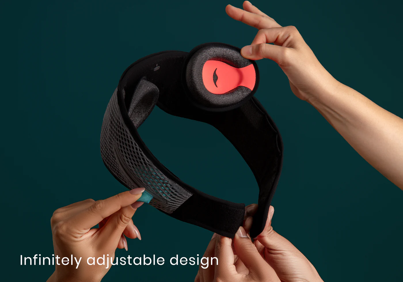 Hands demonstrating the infinitely adjustable design of the head strap and eye cups of a contoured sleep mask with headphones.