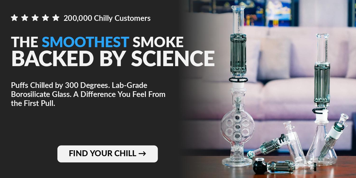 glass bongs on table in front of couch