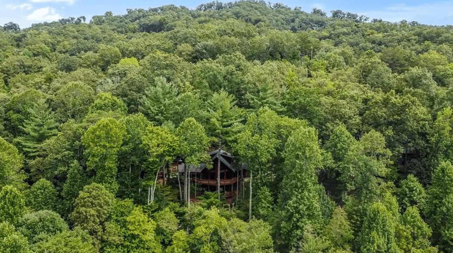 The Grounding Lodge offers true mountain seclusion with treetop forest views while still being just minutes from everything downtown Blue Ridge has to offer — restaurants, shops, events, and family activities.