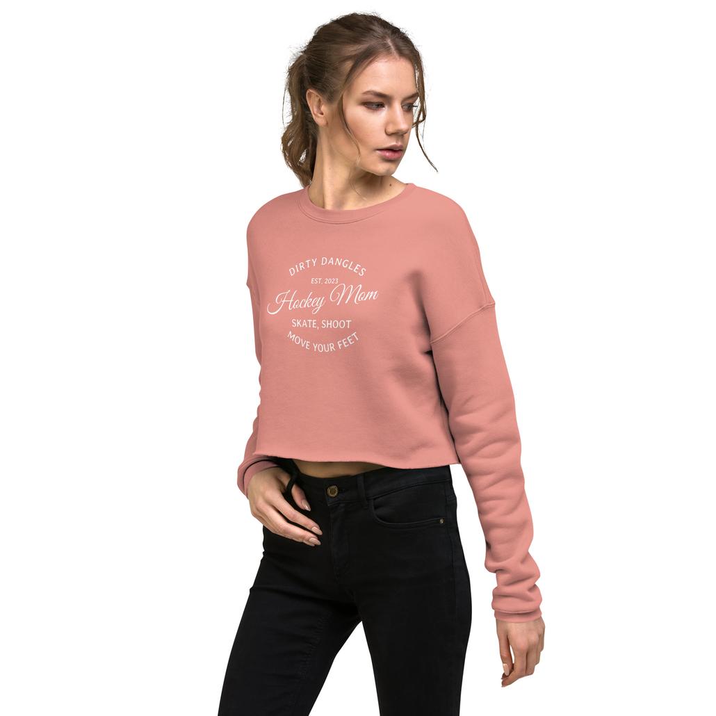 A hockey mom in a pink crop hoodie. Dirty dangles hockey mom