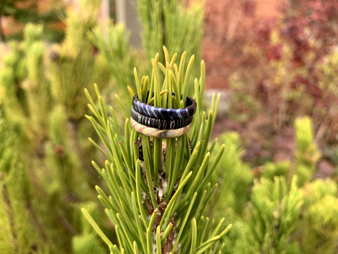 Stackable wedding rings are typically made in a smaller width to allow multiple to be worn at once