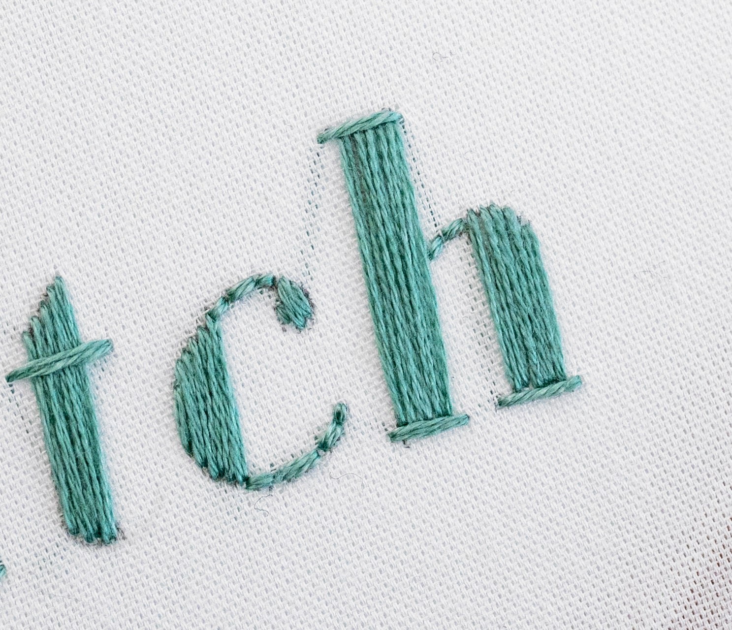 The word 'satin stitch' is stitched using satin stitch.