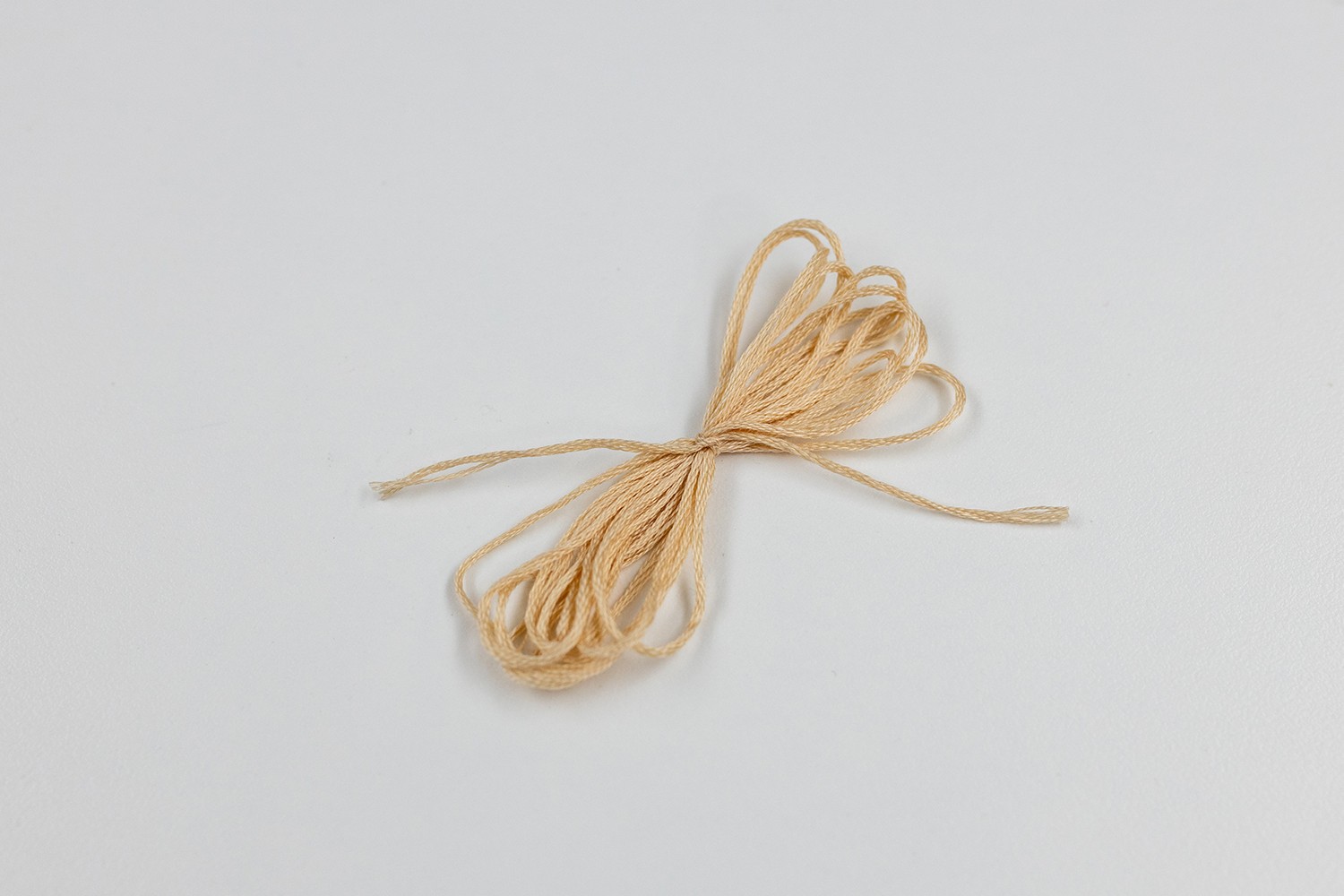 A bundle of thread is tied using thread.
