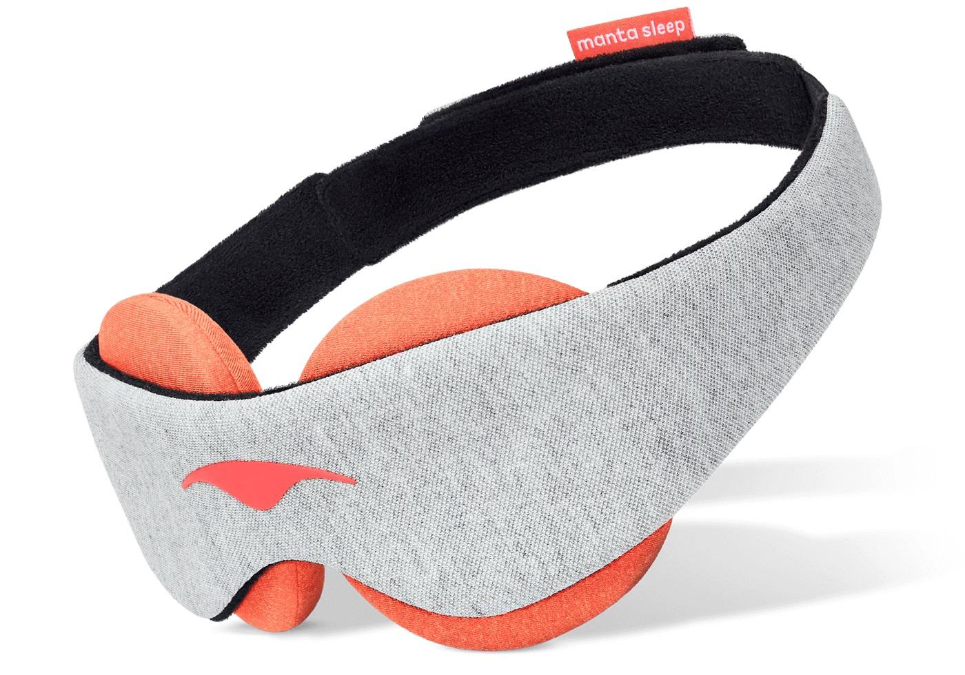 A gray sleep mask with orange steam eye cups