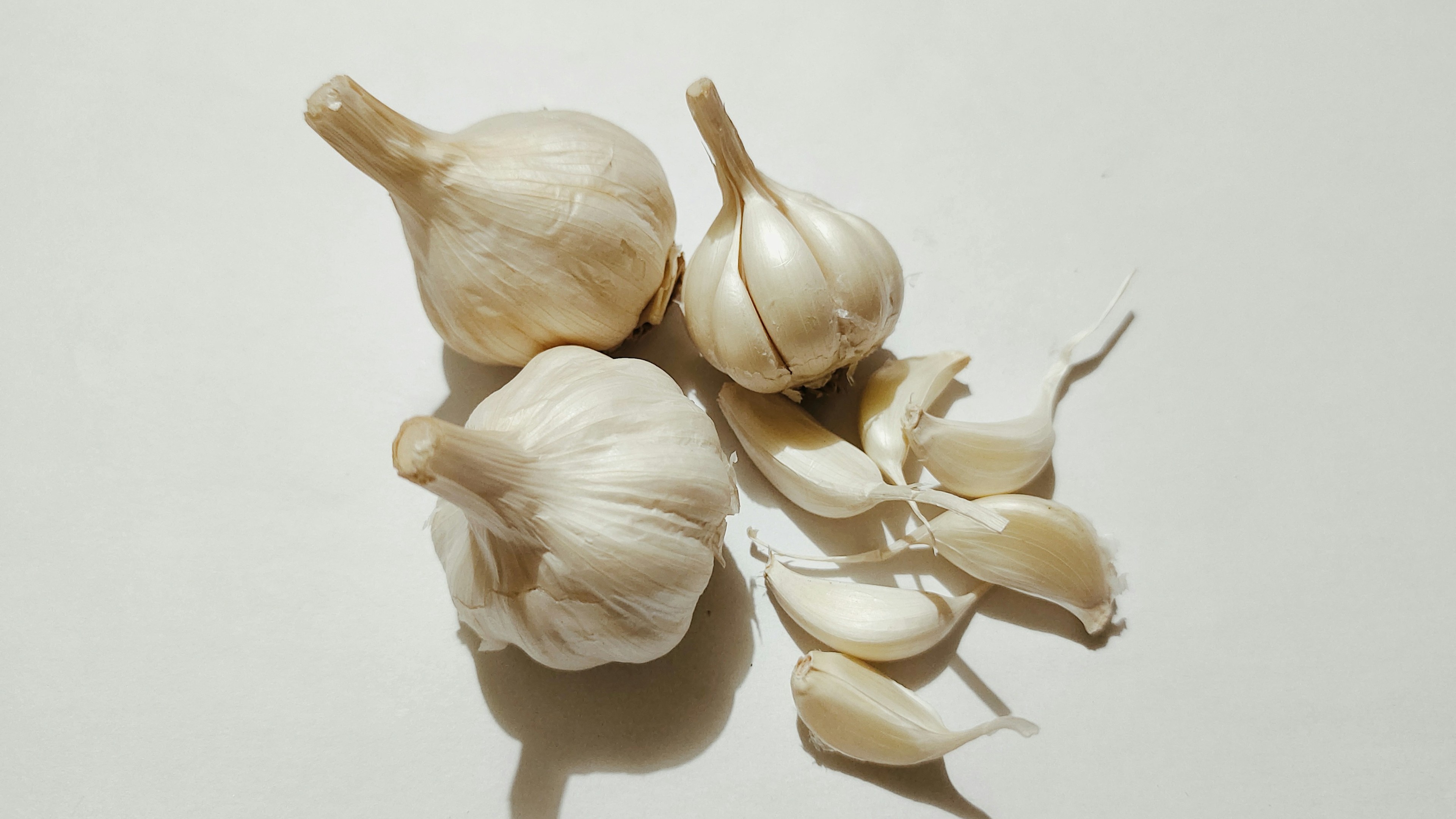 3 bulbs of garlic with several cloves