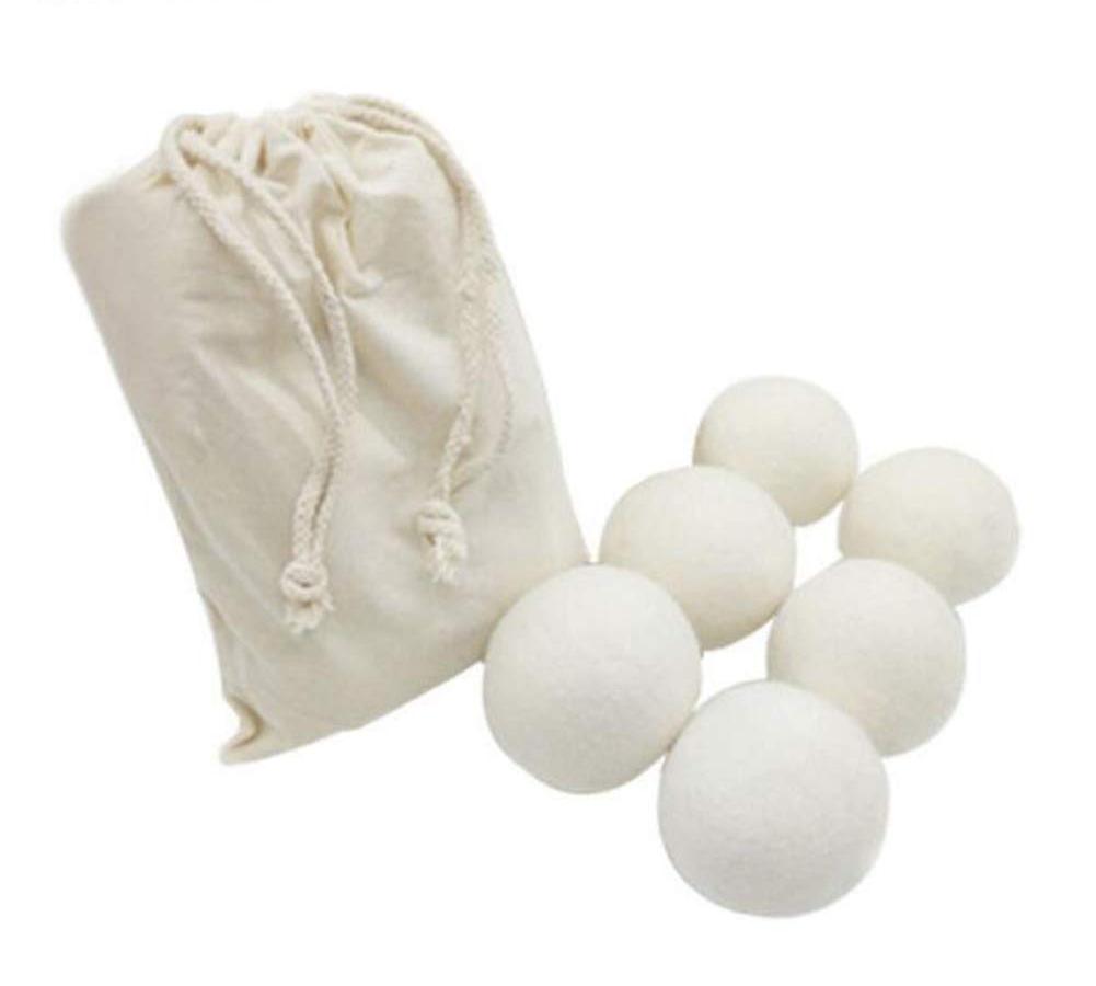 How to Dry Clothes Indoors Faster Innovative Drying Aids: Dryer Balls and Sheets