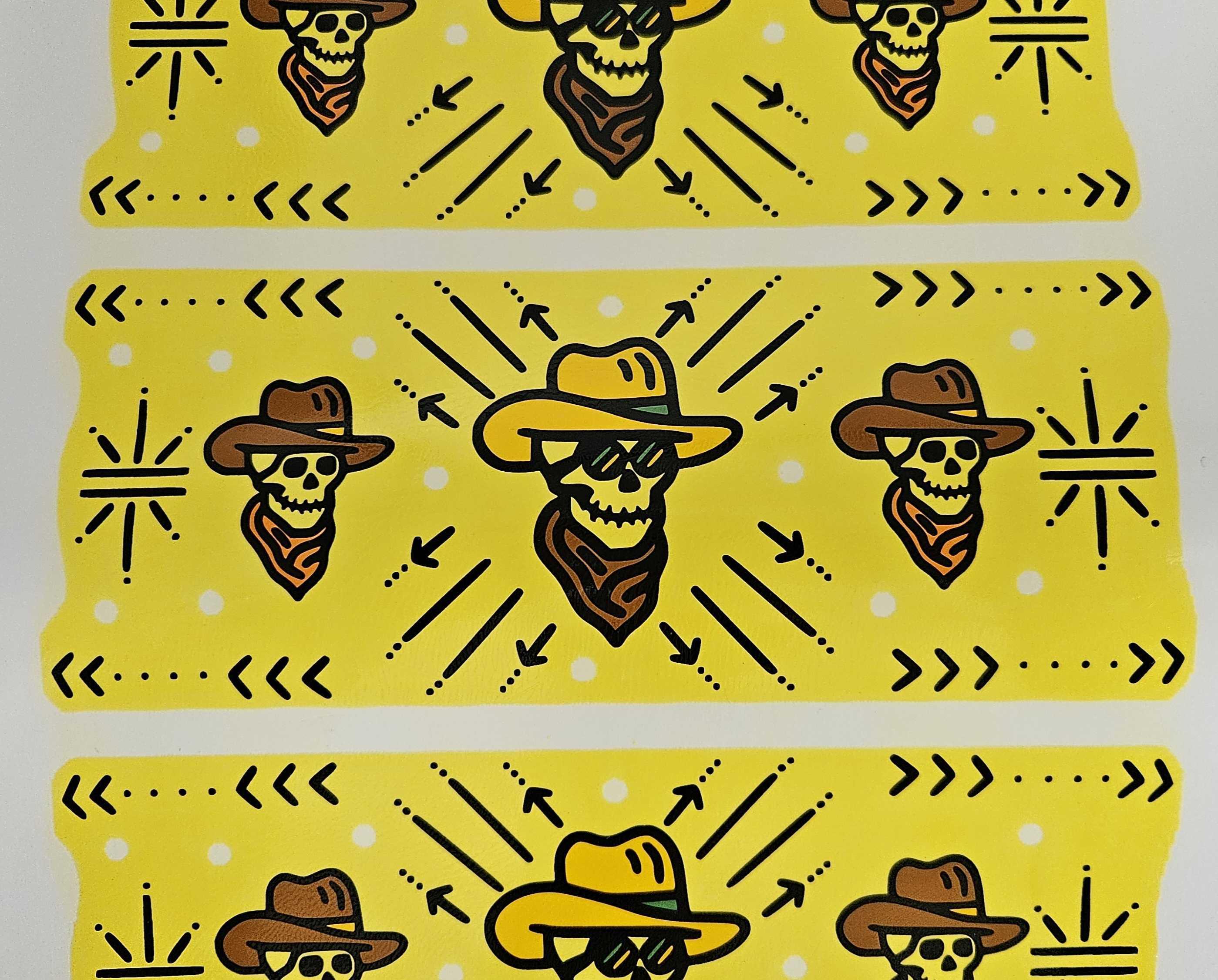 A raw, unfired decal sheet for the Prism x Kickstep.Design Desert Dream'n collection. This image illustrates the specialized water-slide transfer process used to apply "Cowboy Skully" and retro mountain motifs to modular glass before they are kiln-fired for a permanent, scratch-resistant finish.